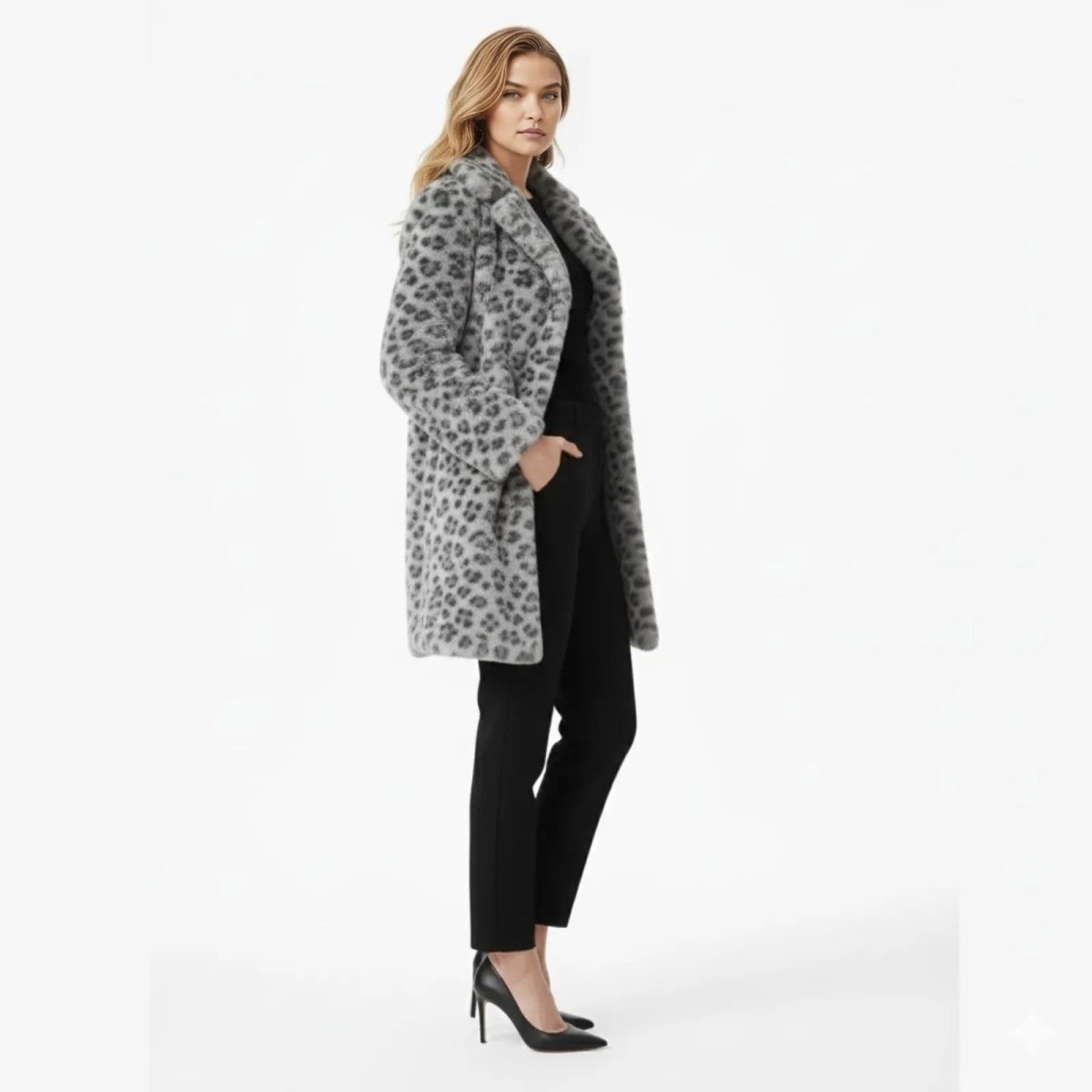 Model in a side profile view showcasing the length and fit of the Kouvr Fashion gray leopard faux fur coat.