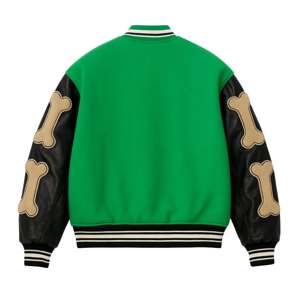 Green Kouvr jacket with black sleeves featuring bone designs on a white background