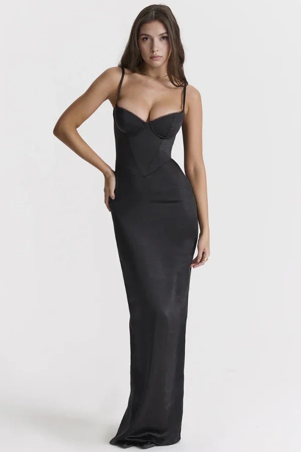 Model wearing the black Haven satin corset maxi gown by Kouvr Fashion, showing the full-length silhouette and boned bodice.