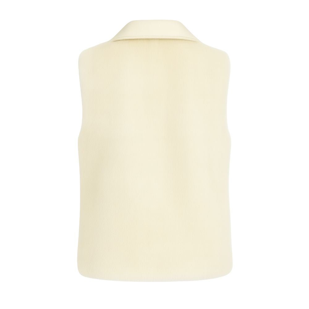 Kouvr Fashion women's ivory genuine leather vest with authentic fox fur collar" and "Interior view of the Kouvr Fashion vest showing the insulated quilted satin lining