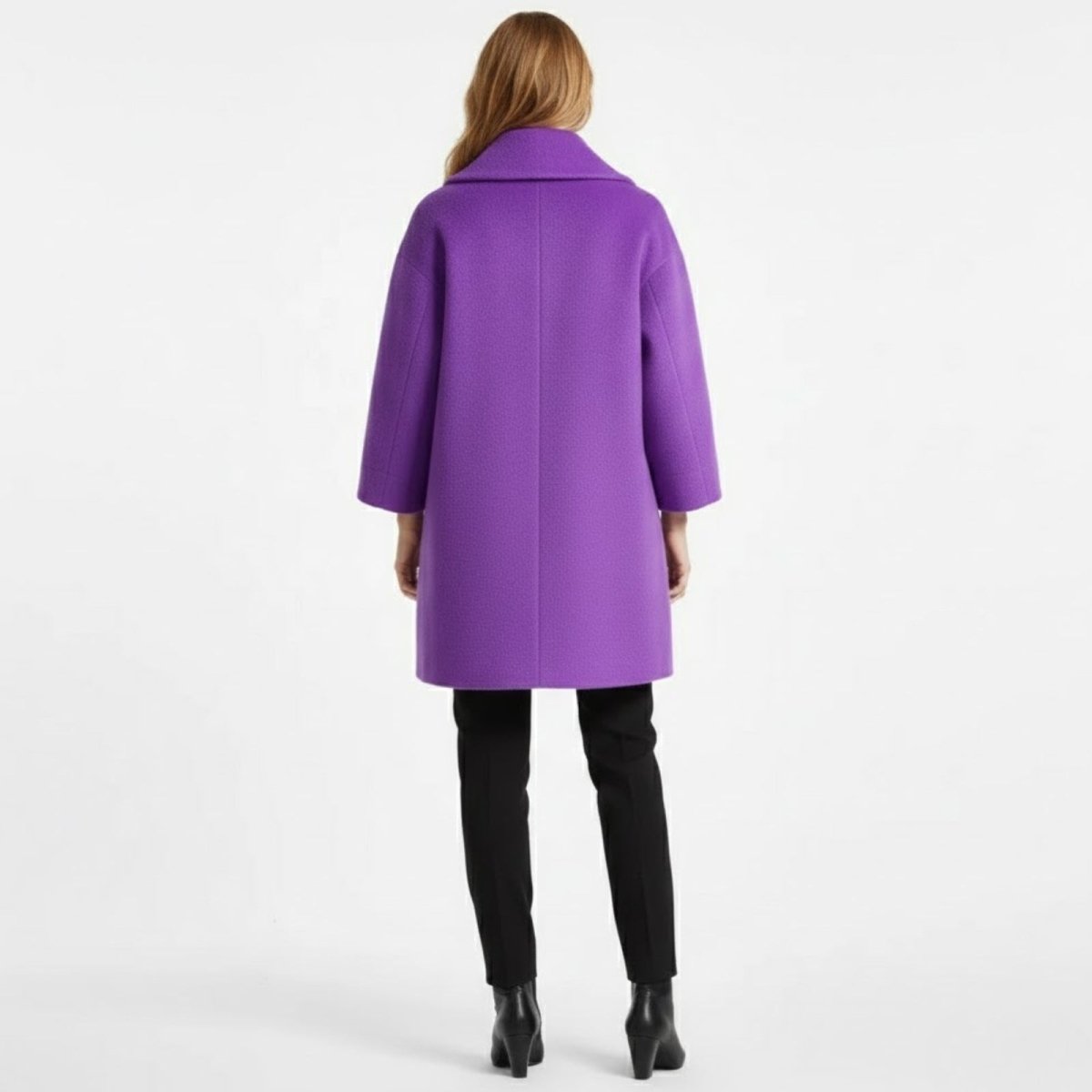 Back view of a model wearing the Kouvr Fashion janice purple wool coat, showing the clean lines and center seam detail.