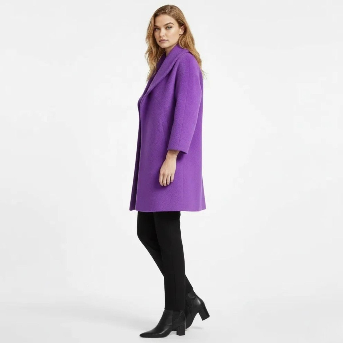 Side profile of a model in the Kouvr Fashion oversized janice purple wool coat, highlighting the relaxed fit and shawl collar drape.