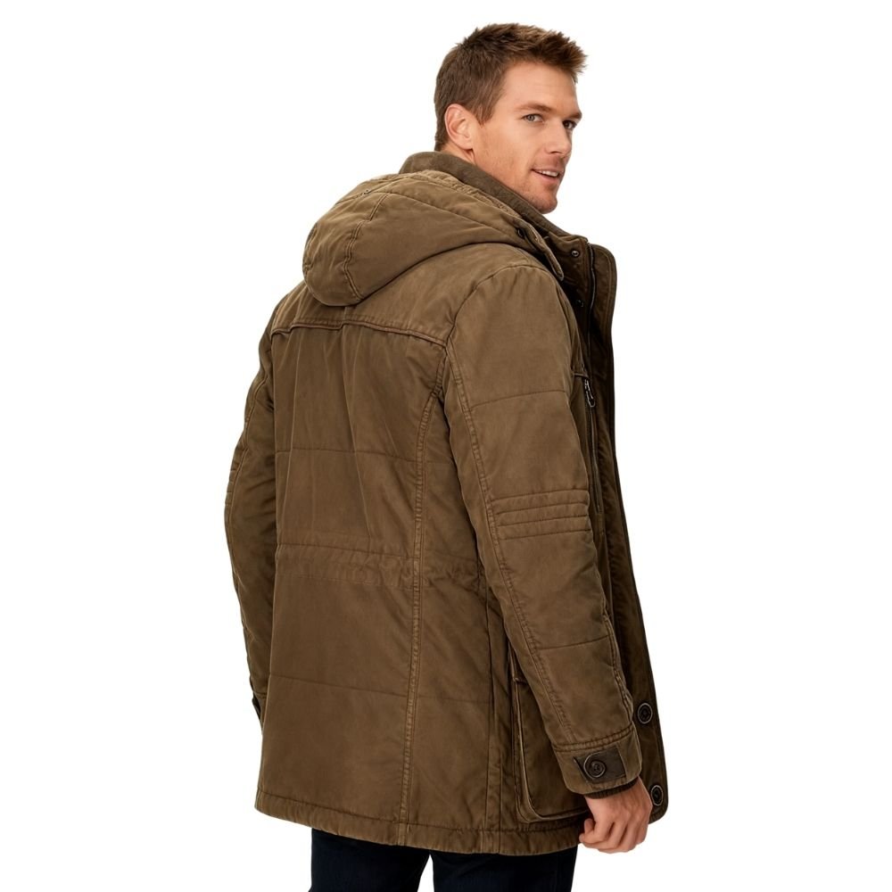 Man wearing a brown  kouvr parka jacket on a white background