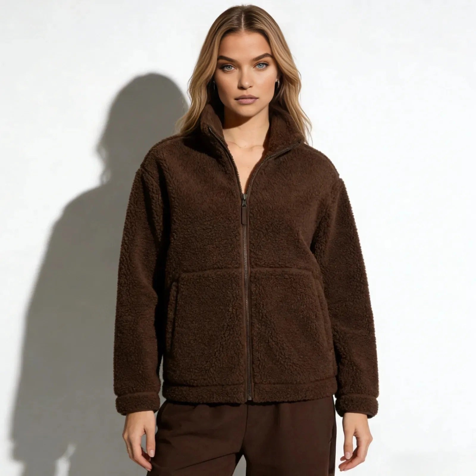 Model wearing the Kouvr Fashion Julie Sherpa Fleece Jacket in a rich dark brown, shown from the front against a white background