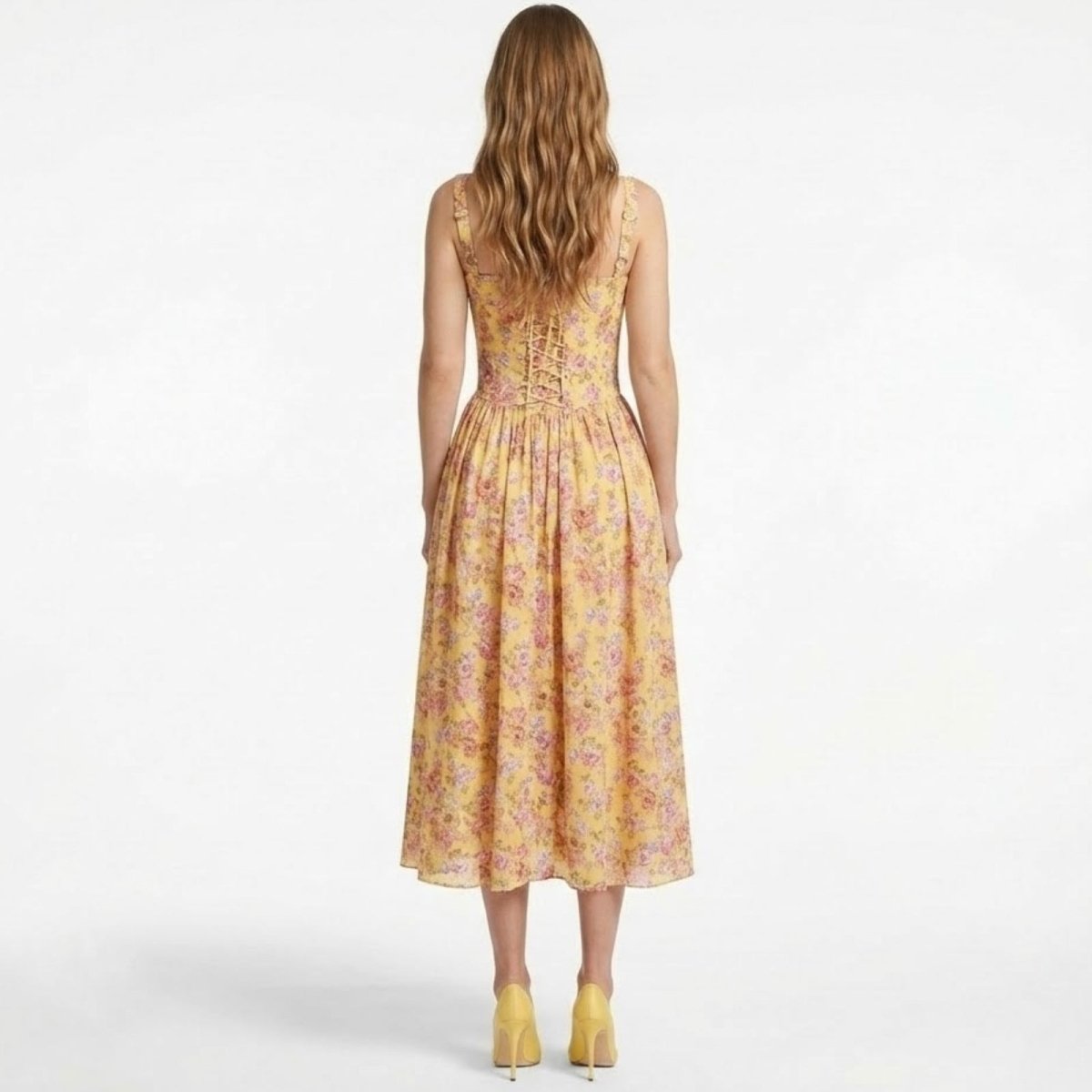 Back view of the Kouvr Fashion Kallirroi midi dress, highlighting the adjustable corset-style lace-up detail.