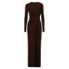 Woman wearing a dark brown kouvr long-sleeve dress on a white background