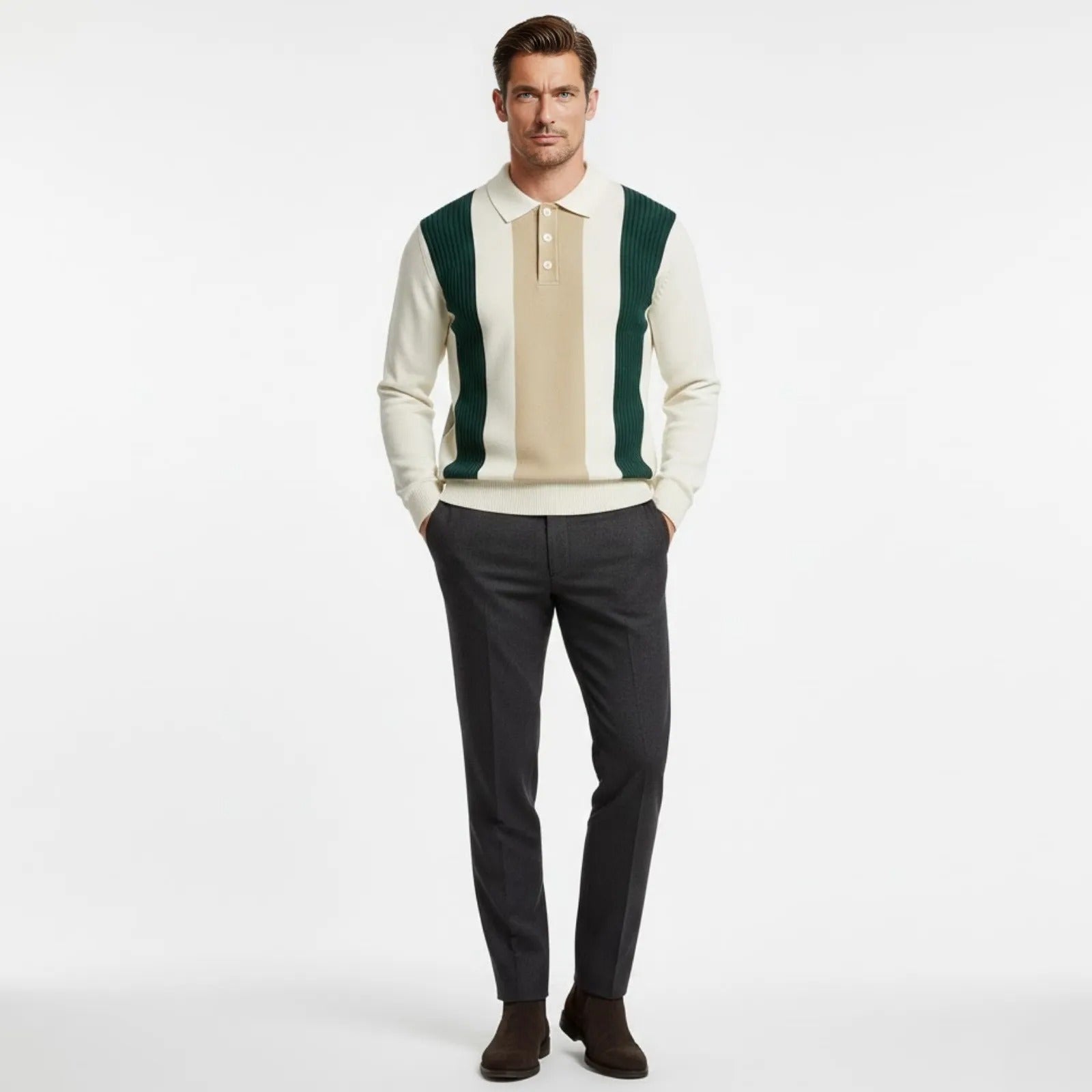 Man wearing the Kouvr Fashion Leandro white, green, and beige vertical striped long sleeve knit polo sweater with dark grey trousers.