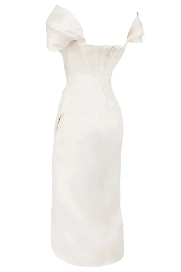 structured bodice, asymmetrical hemline, sweetheart neckline, sculpted silhouette, boning, and figure-flattering