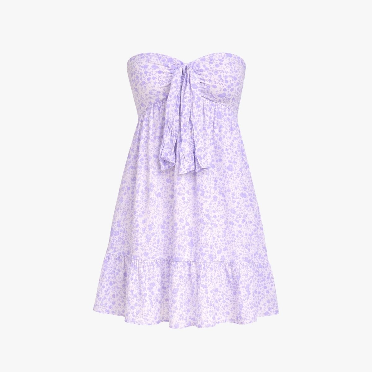 Product flat lay of a lilac ditsy floral print strapless mini dress, showing the front tie bow and tiered skirt.