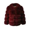 Front view of a women's crimson red paneled faux fur jacket with a plush high collar on a plain background.