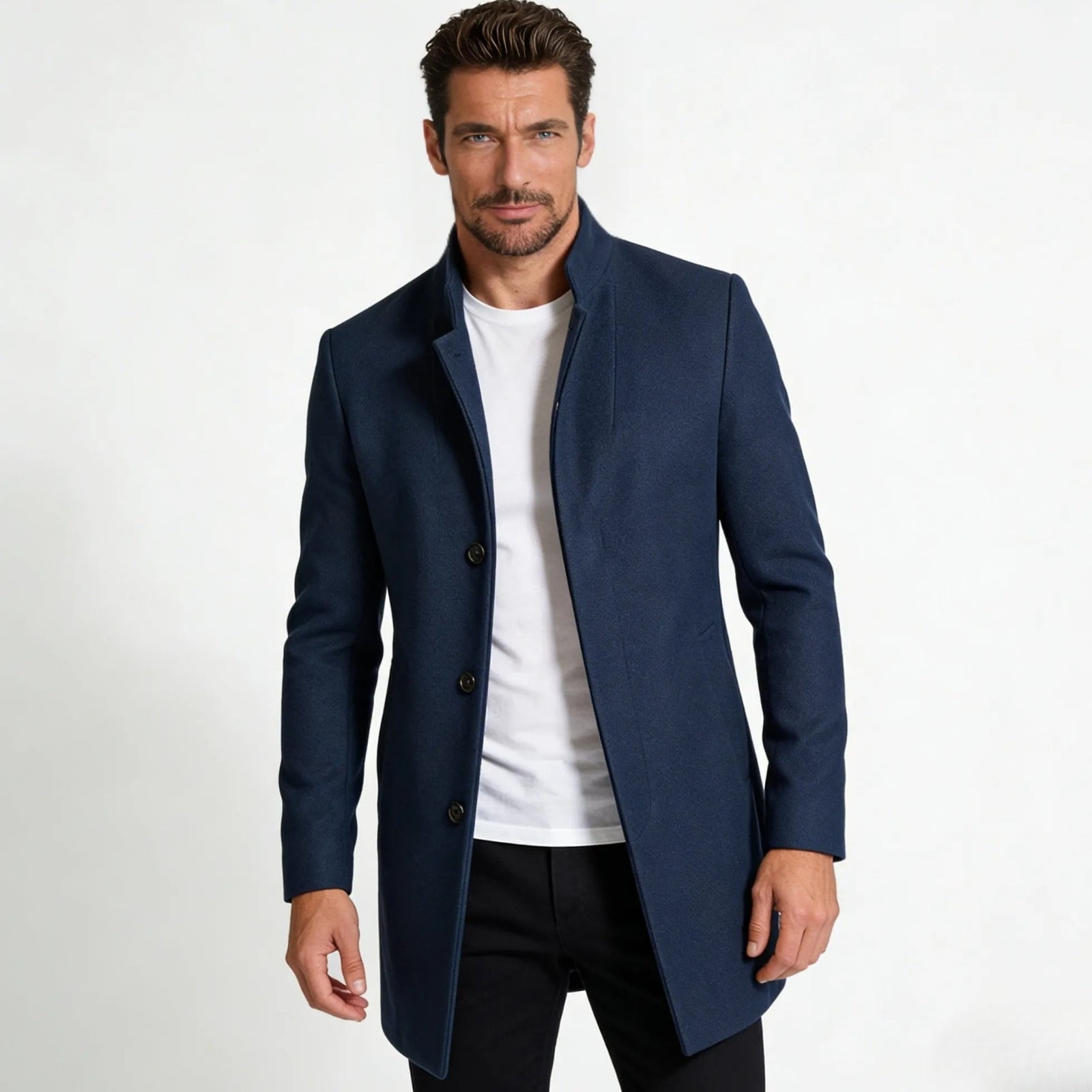 Model wearing the Kouvr Fashion men's blue wool stand collar overcoat with a white t-shirt and black trousers.