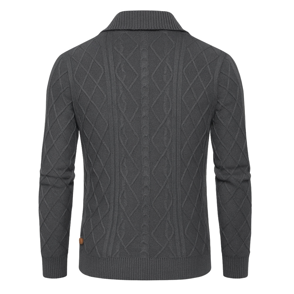 Grey Kouvr cable knit sweater on a white background
