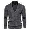 Grey Kouvr cardigan on a plain background