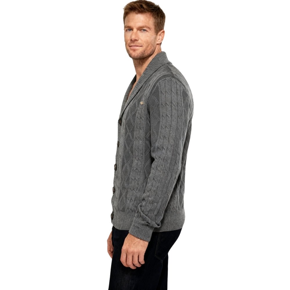 Man wearing a gray kouvr cable knit cardigan on a white background
