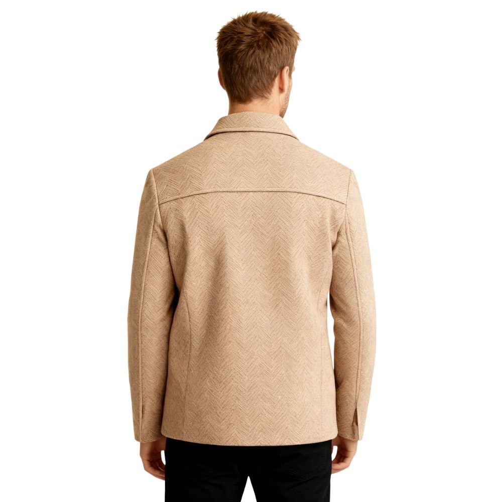 Man wearing a khaki kouvr jacket on a white background