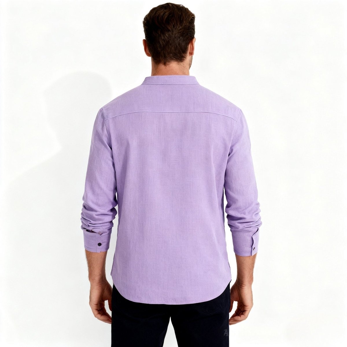Back view of a male model in the Kouvr Fashion lavender linen shirt, showing the horizontal back yoke detail.