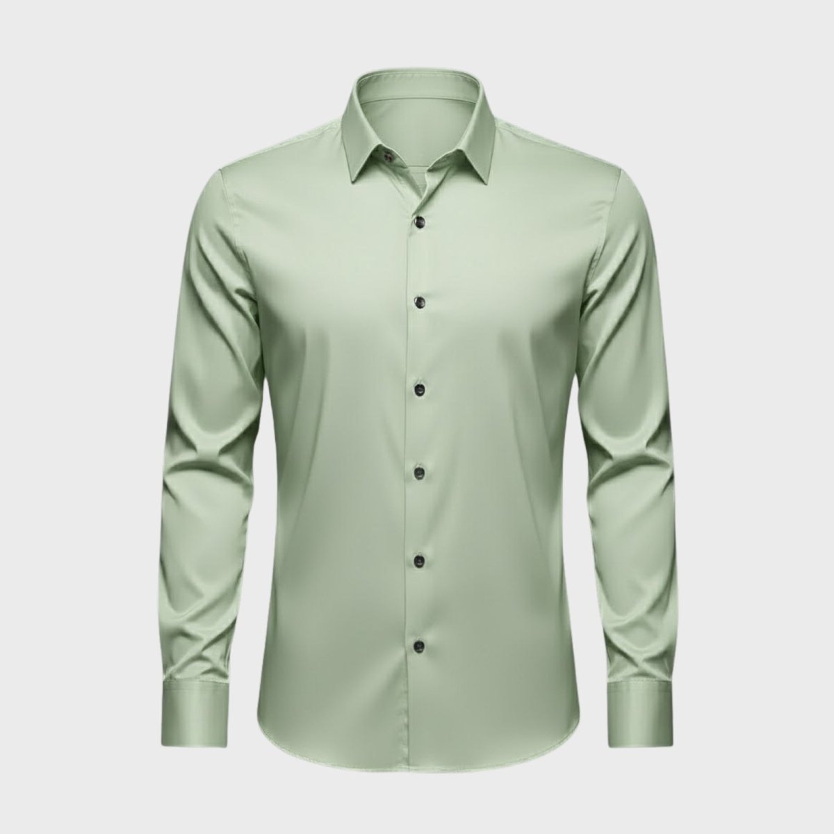 Front product shot of the Kouvr Fashion long-sleeve dress shirt in light green, laid flat to display the full button placket and collar.