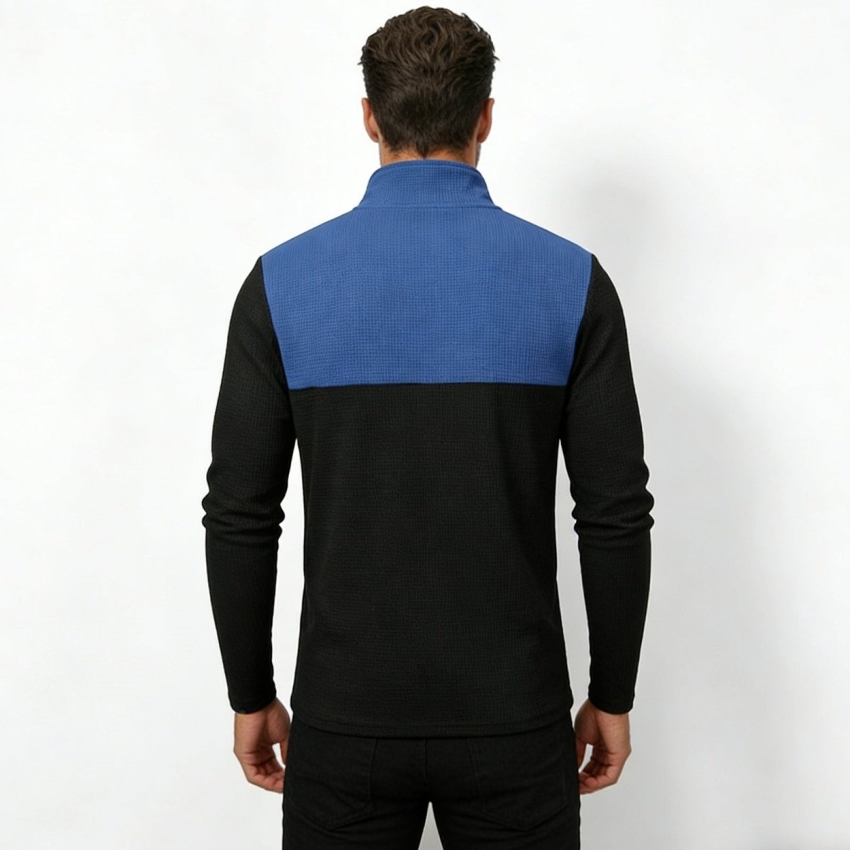 Back view of model showing the blue and black color block design of the Kouvr Fashion men's long sleeve pullover.