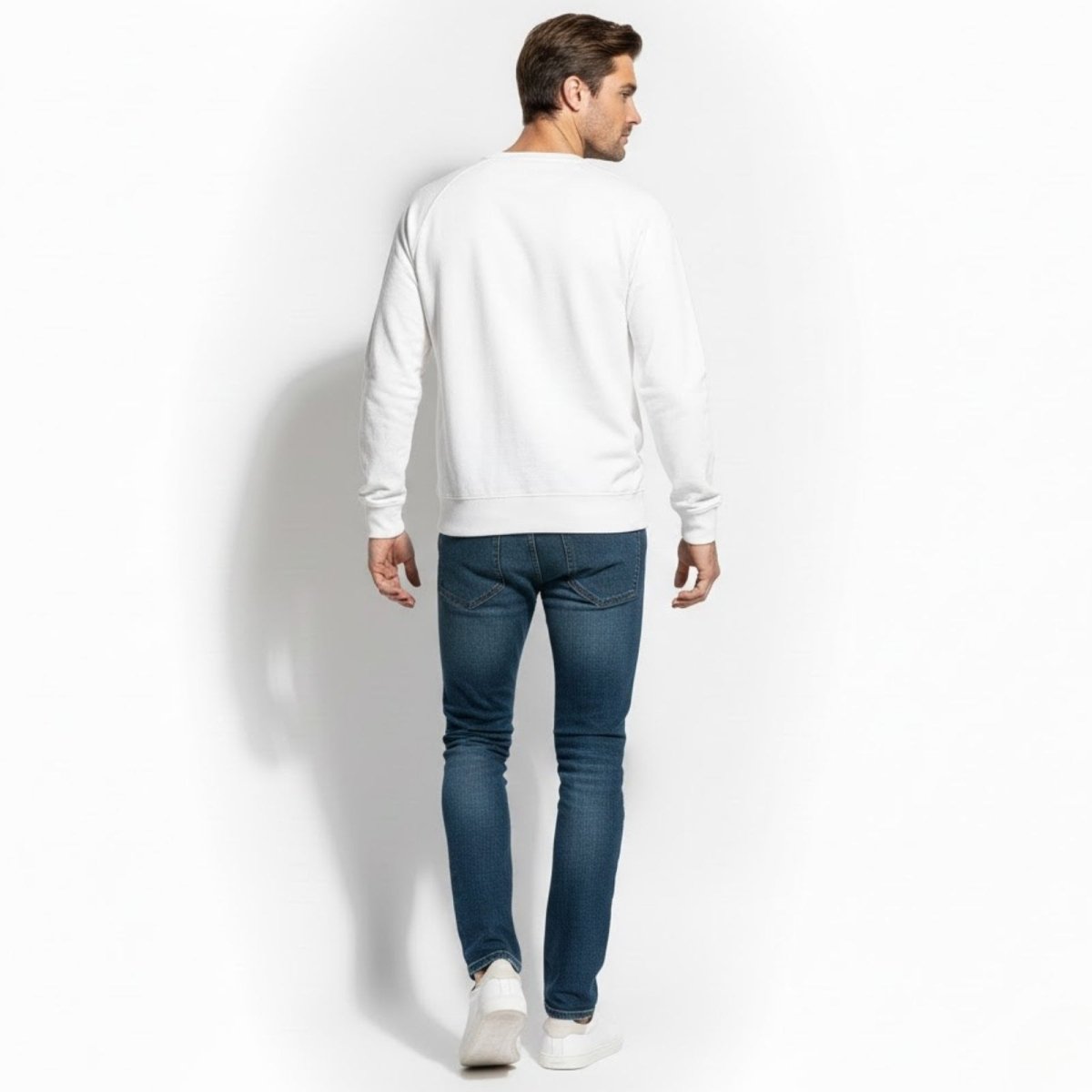 Back view of the Kouvr Fashion men's white minimalist crewneck sweatshirt.