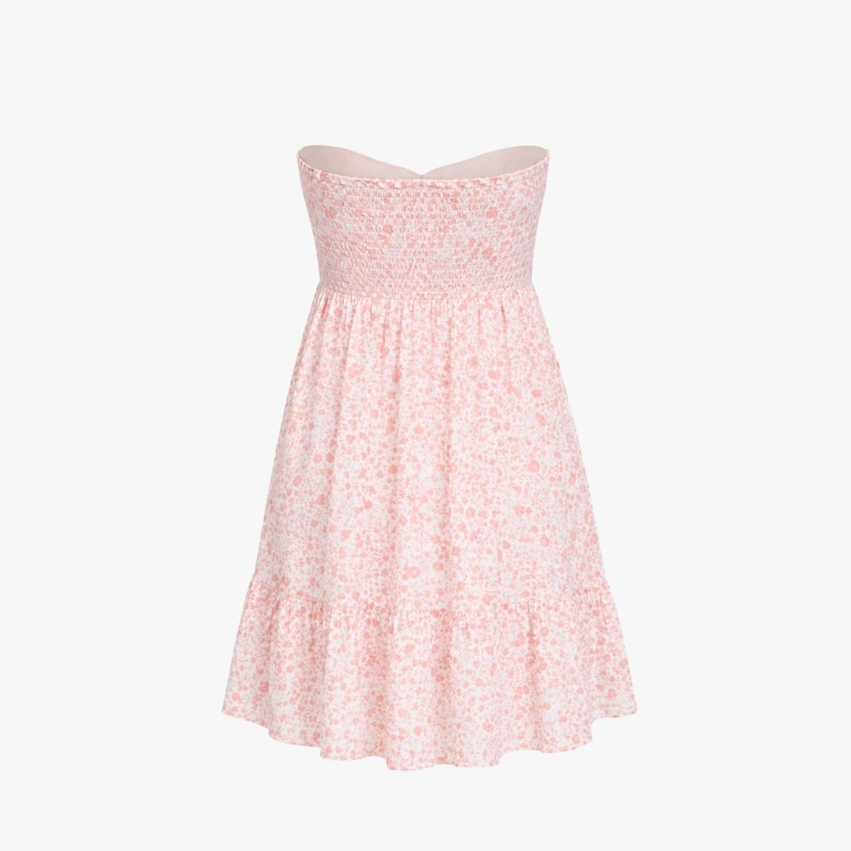 Flat lay of the back of the orange floral strapless mini dress, detailing the texture of the elasticated smocked panel.