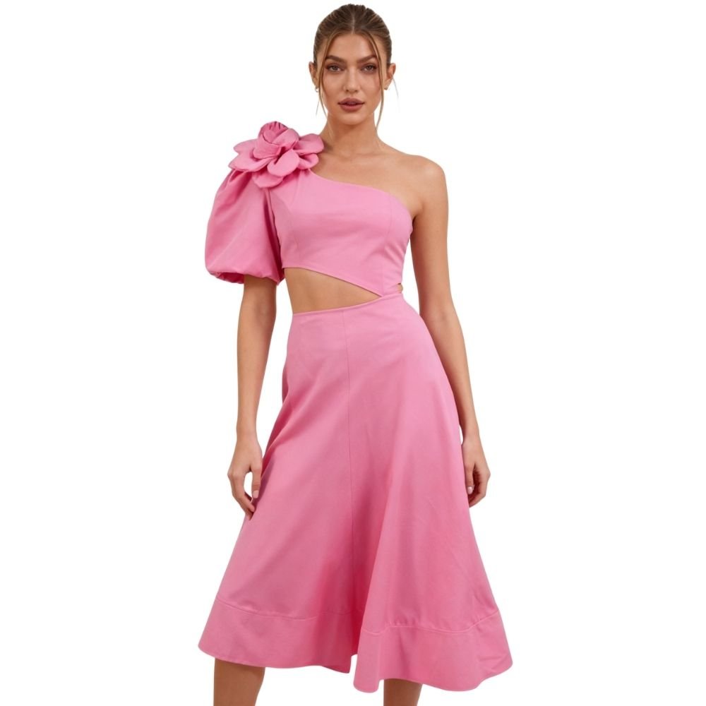 Model wearing Kouvr's pink one-shoulder midi dress with a large rose on the shoulder and a side waist cutout
