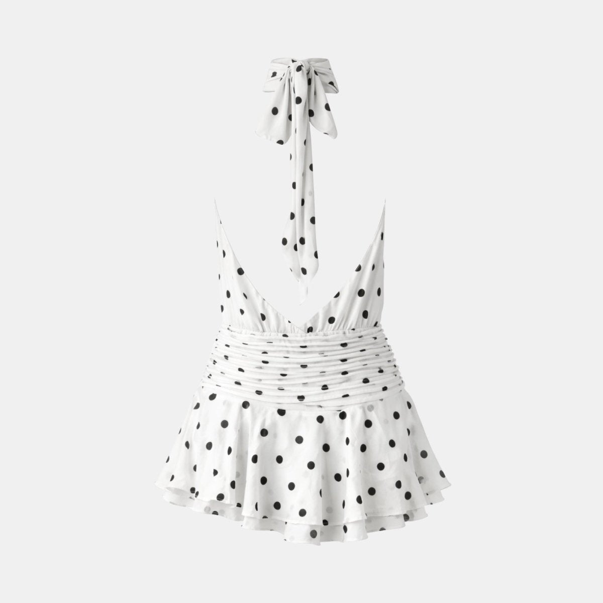Flat lay back view of the Kouvr Fashion polka dot mini dress, displaying the low back design and halter neck tie.