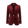 Flat lay of a single-breasted red velvet blazer showing the lapels, gold and pearl button, and rich velvet texture.