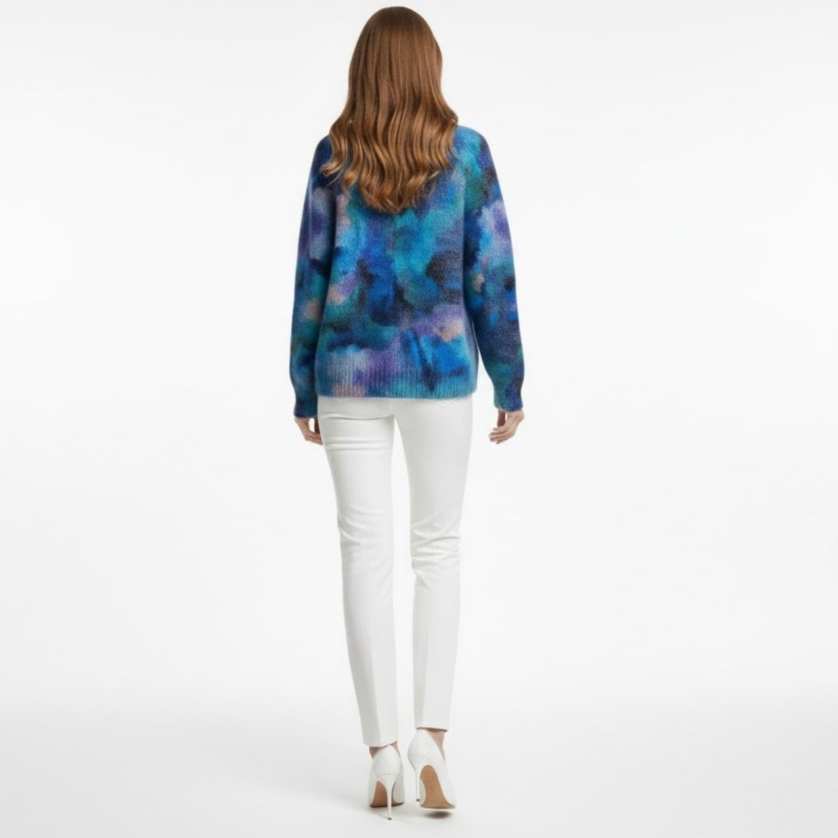Model from behind showing the fit and full pattern of the Kouvr Fashion Regina oversized blue and purple mohair turtleneck sweater.