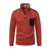 Product shot of the red orange quarter-zip sweater with high mock neck collar and faux suede chest pocket detail.