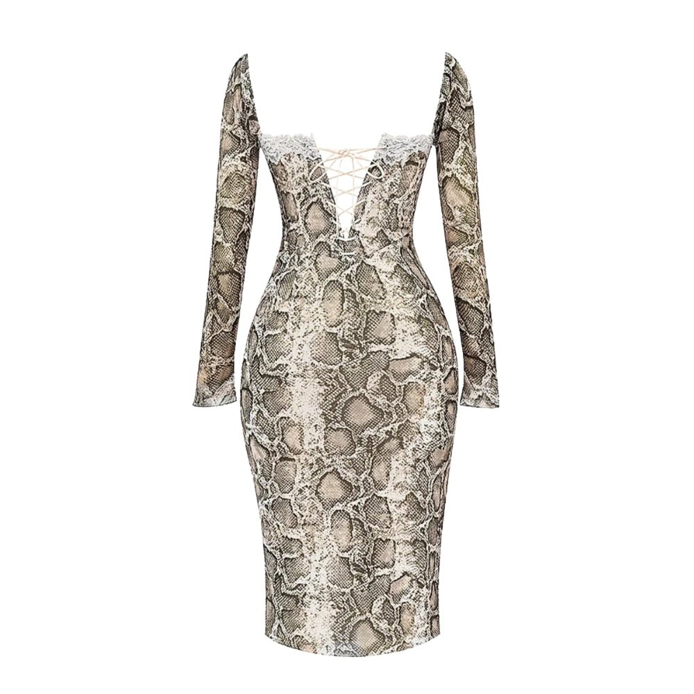 Snake print Kouvr dress with long sleeves on a white background
