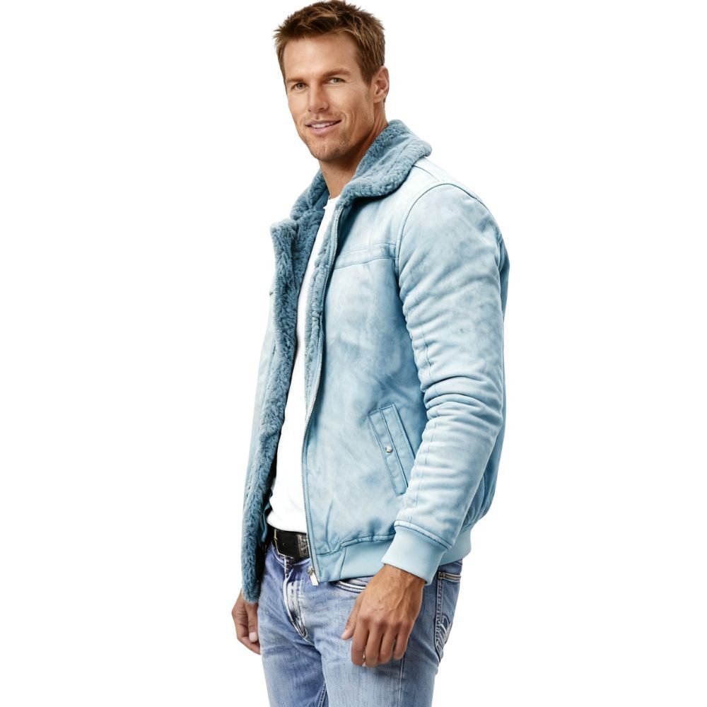 Man wearing a sky blue kouvr jacket with a white background