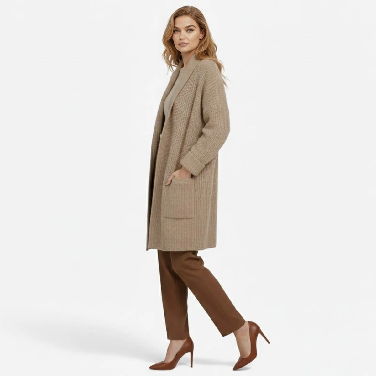 Side profile of a woman in an oversized taupe analyn collar sweater coat from Kouvr Fashion, showing its knee-length and relaxed fit.