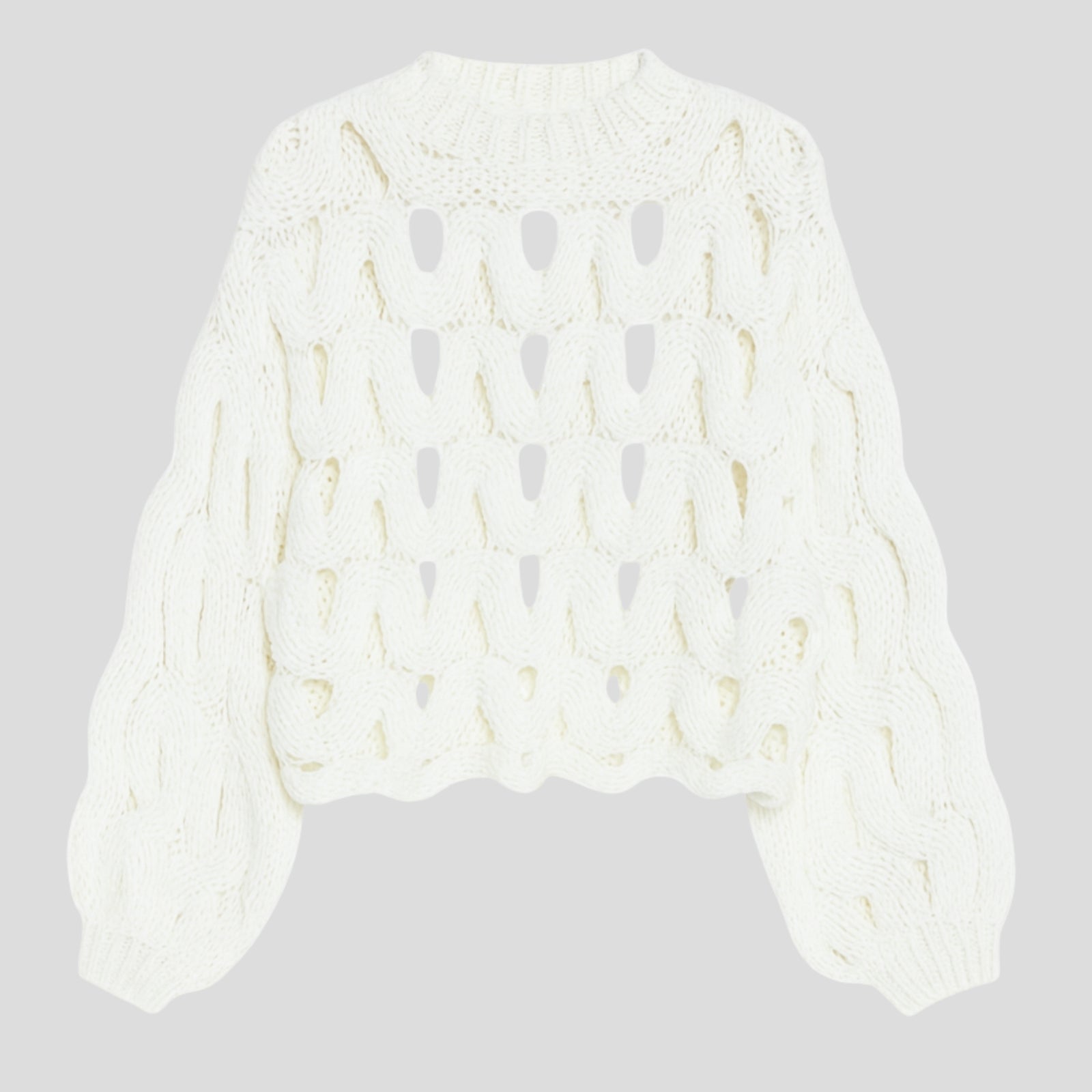 Flatlay product shot of the Kouvr Fashion white cutout chunky knit sweater, front side, on a light grey background.