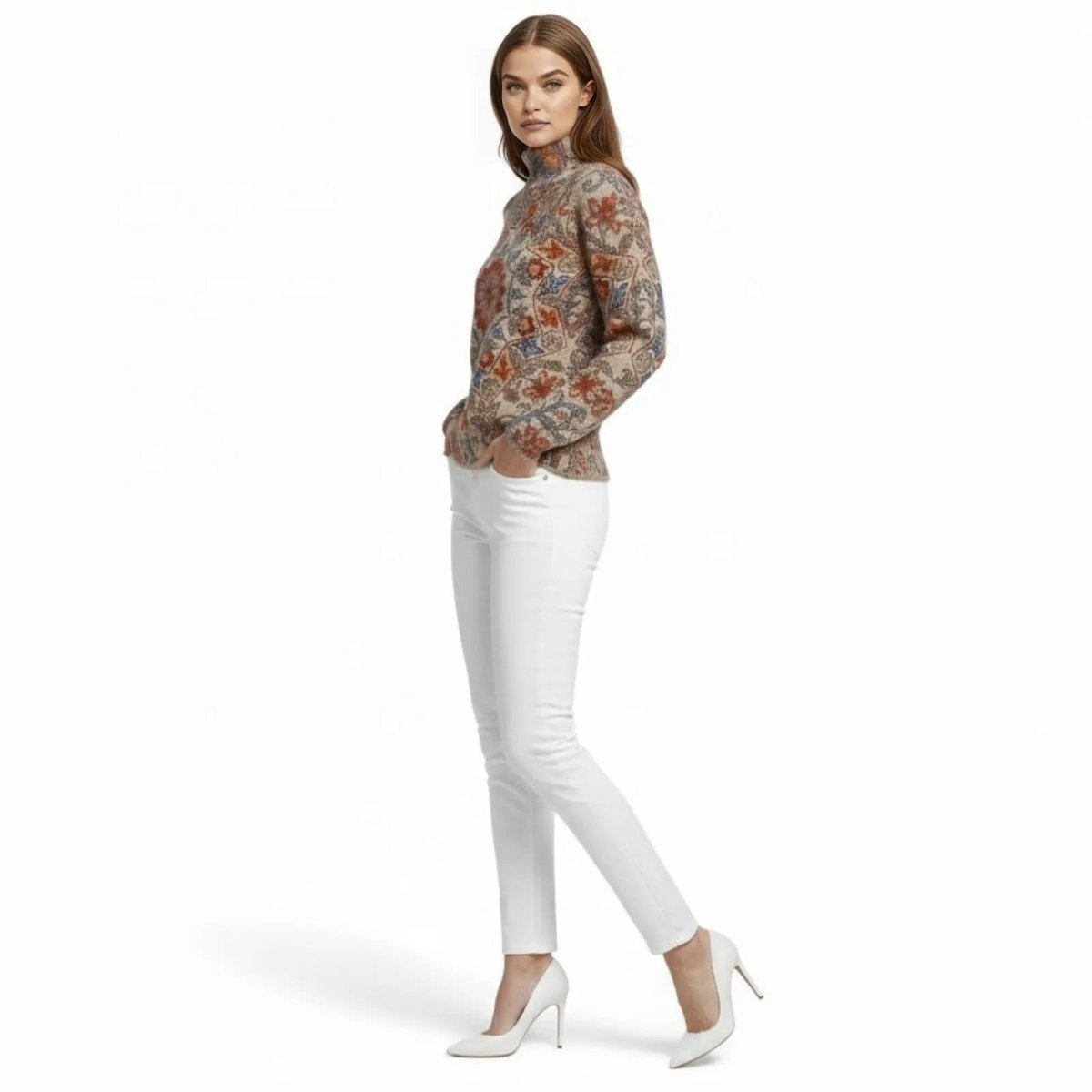 Side profile of a woman in a multicolor wool cashmere blend sweater with an intricate floral and geometric pattern on the sleeves and body.