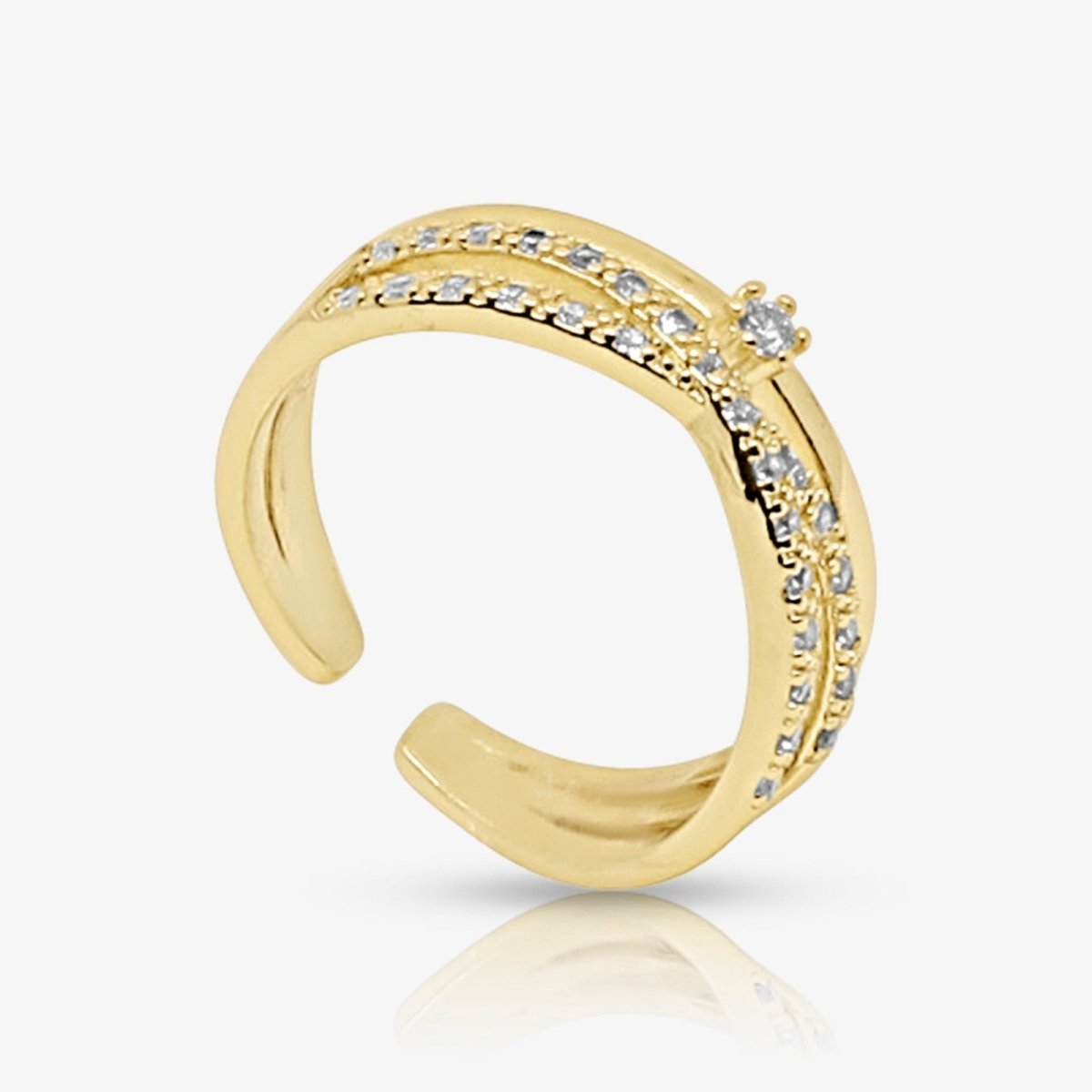 Gold kouvr open ring with embedded diamonds on a white background