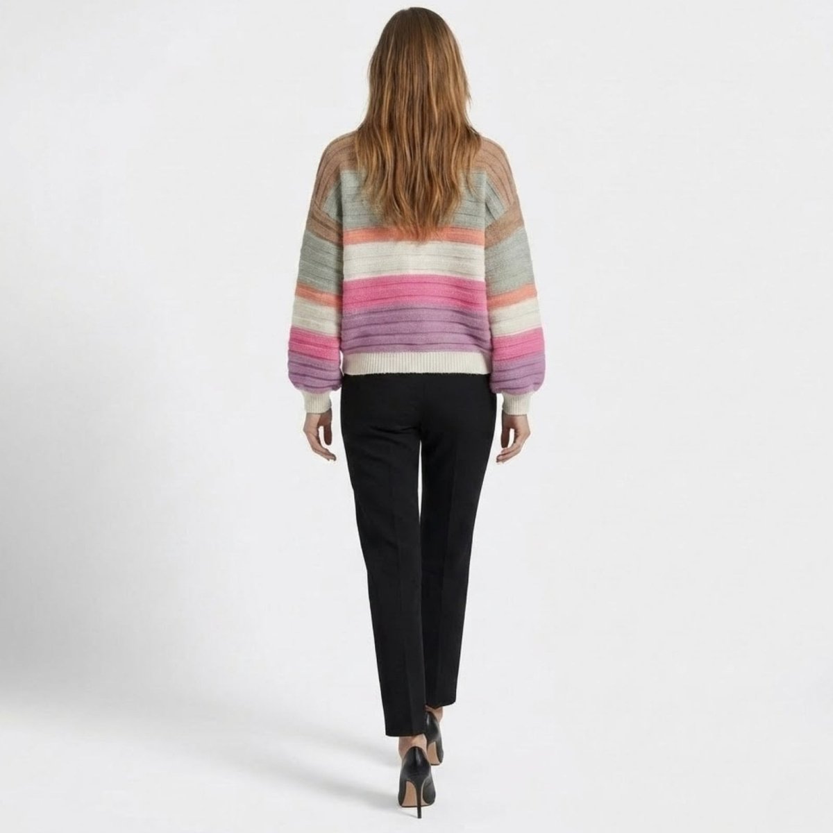 Back view of the Kouvr Fern multicolor striped cardigan on a model, highlighting the stripe pattern and balloon sleeves