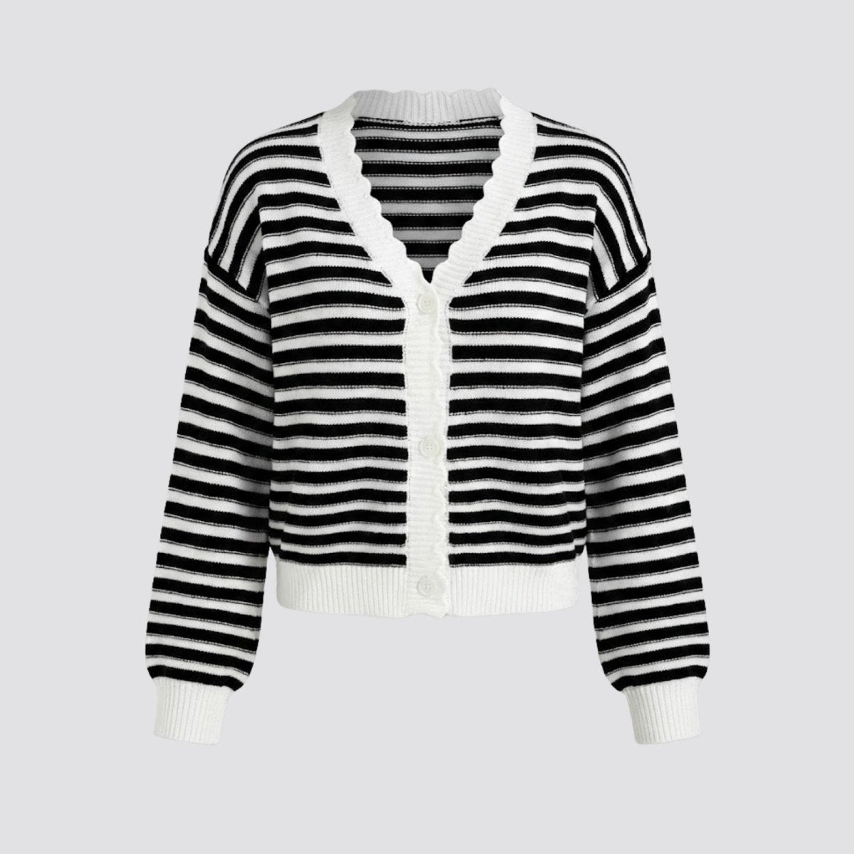 Flat lay image of the front of the Kouvr black and white striped cardigan, detailing the scalloped v-neck trim and white buttons.