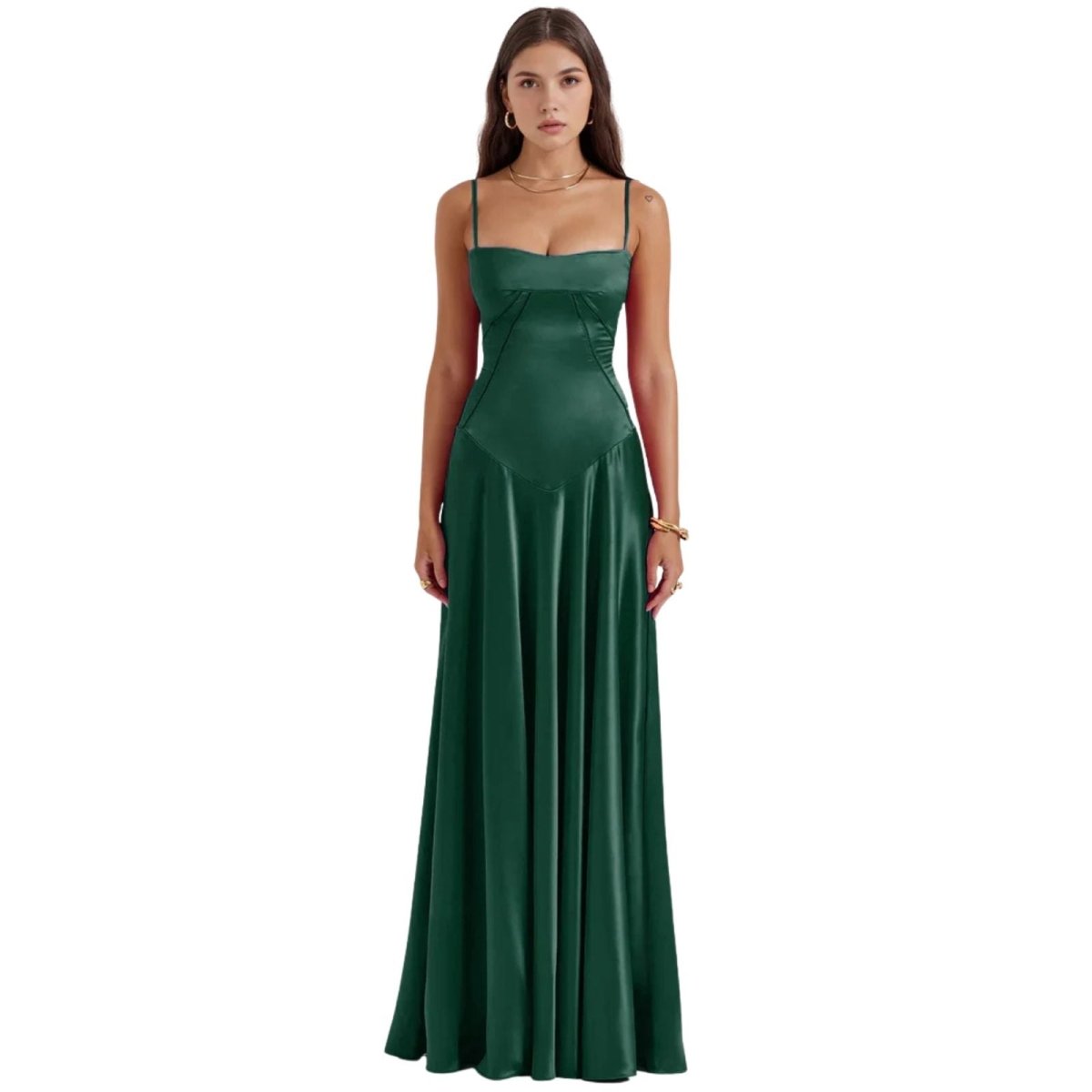 Woman wearing a green kouvr evening gown on a white background