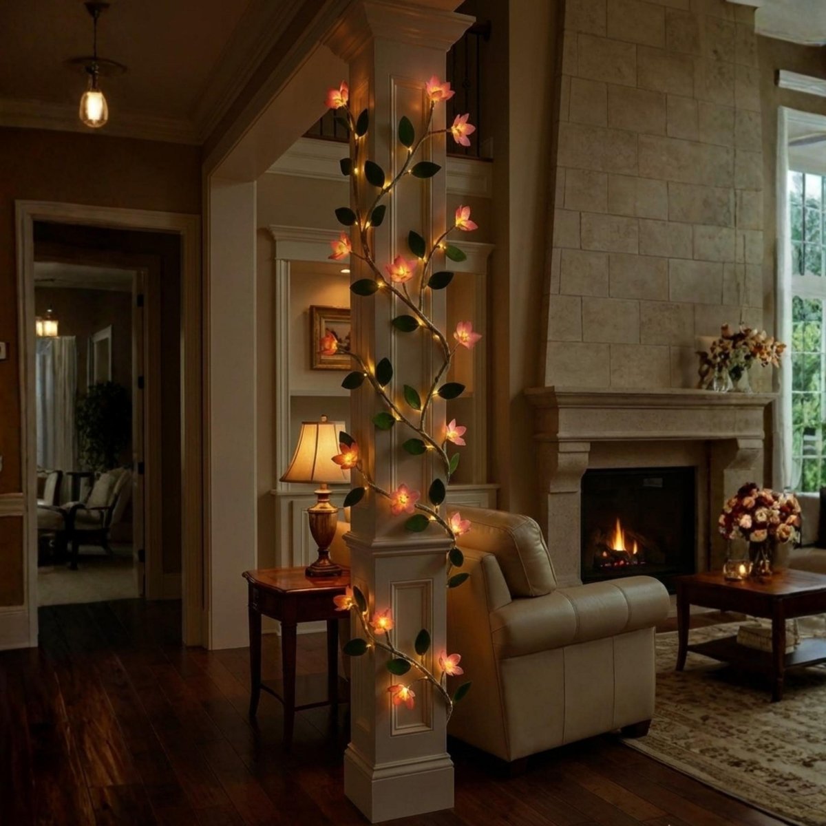 The Kouvr glowing botanical vine wrapped elegantly around a white architectural pillar in a luxury home, providing ambient accent lighting.