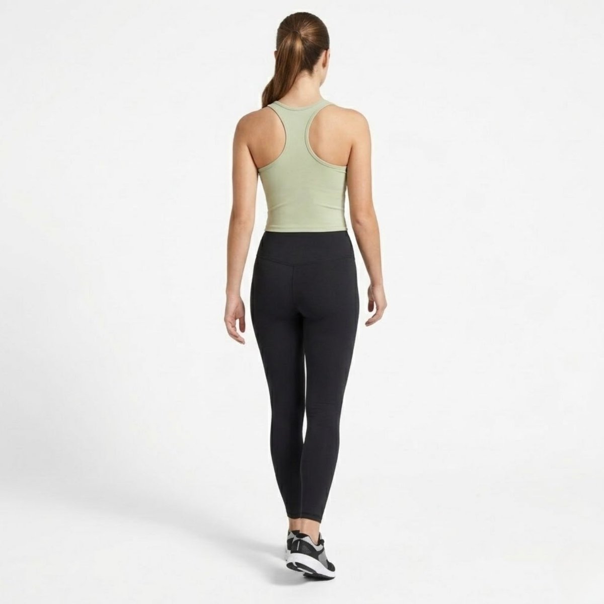 Back view of Kouvr luxury green scoop neck racerback activewear crop top with premium matte finish.