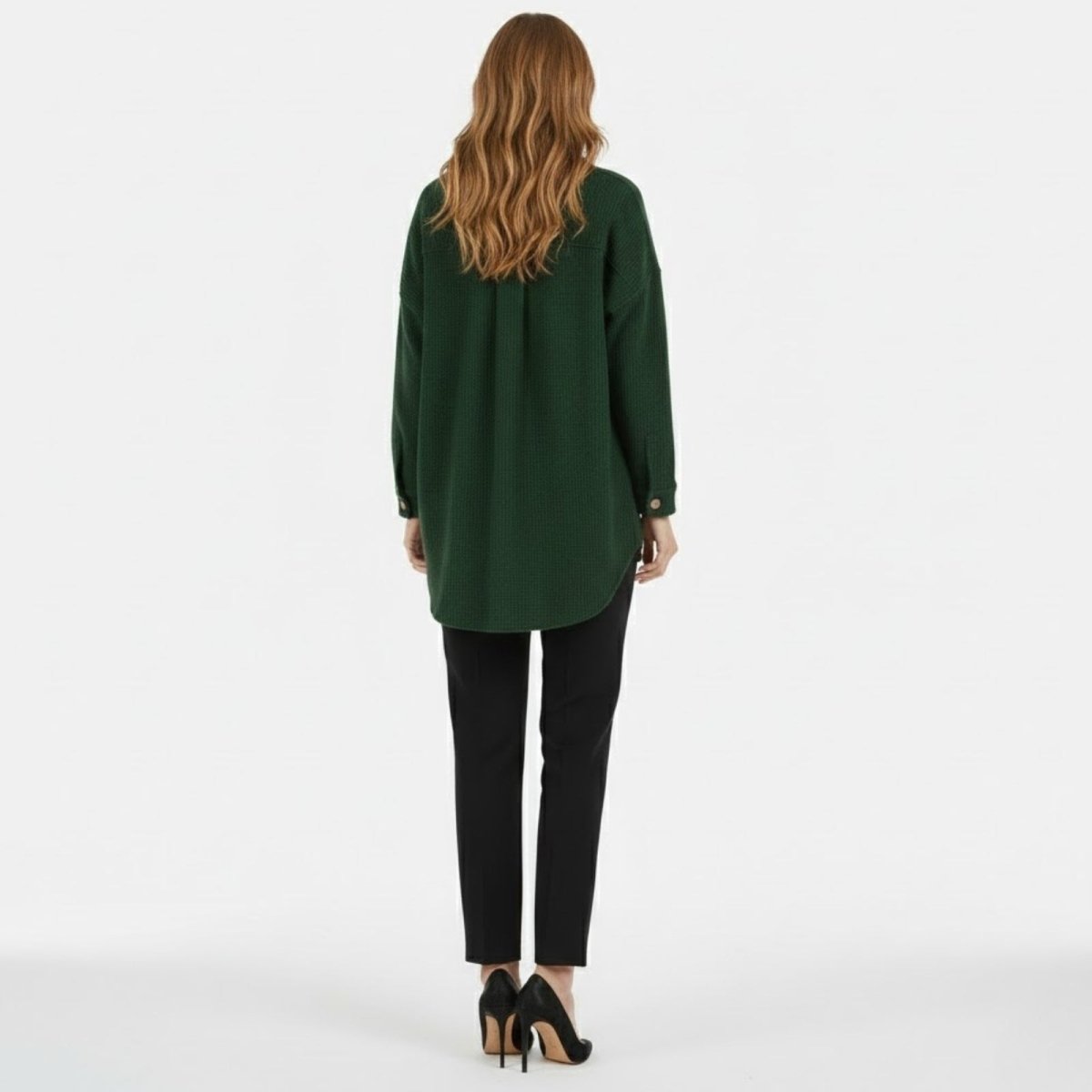 Back view of the green waffle knit shacket, displaying the oversized fit and pleated yoke detail on the model.