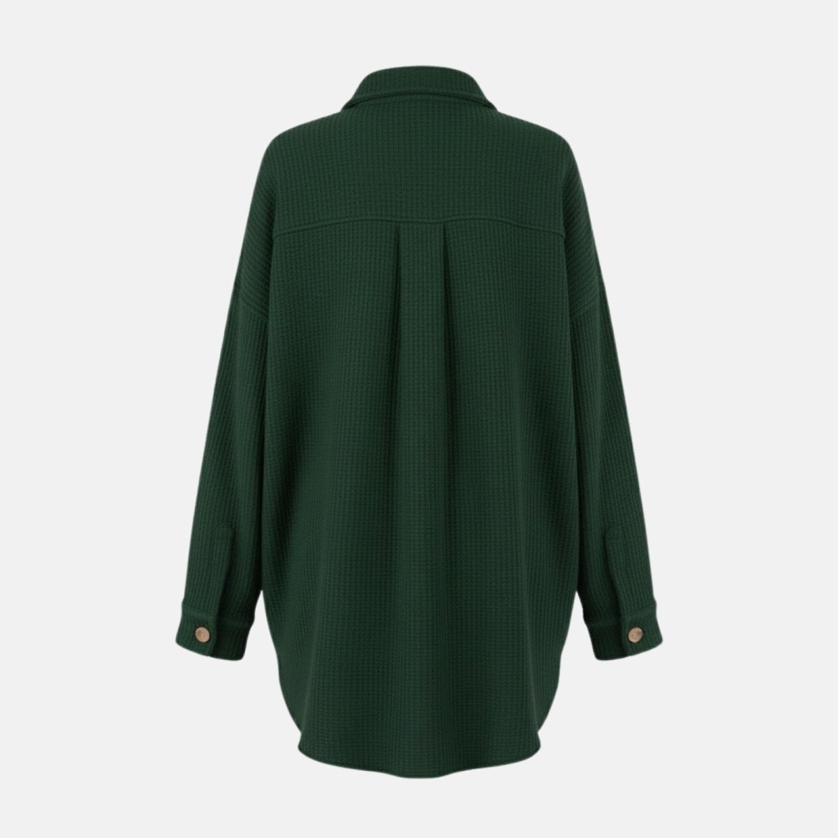 Flat lay of the back of the green shacket, highlighting the clean construction and curved hemline.