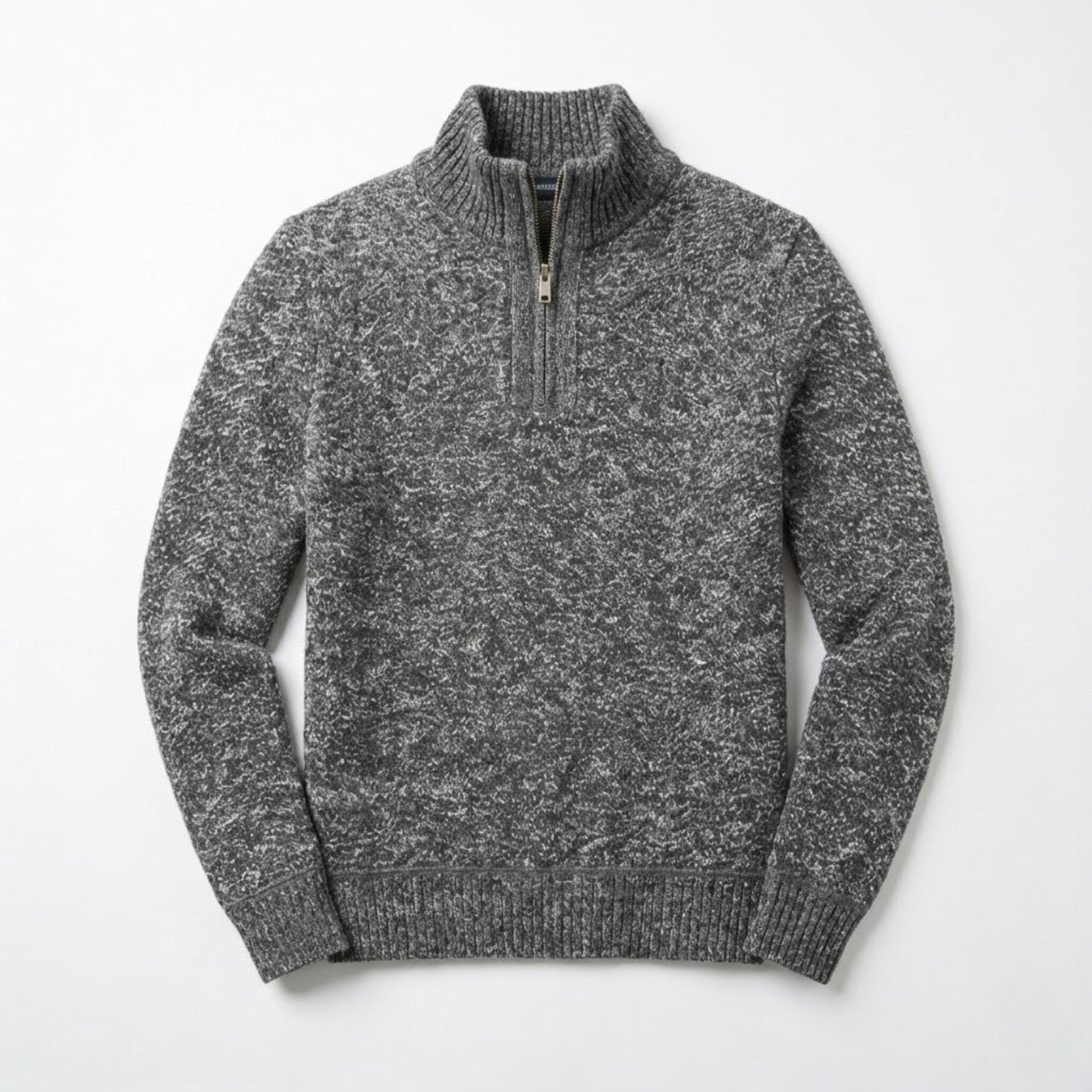 Flat lay studio shot of the Kouvr men's quarter-zip sweater in grey, detailing the marled knit pattern and zip hardware.