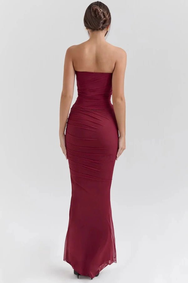 Back view of the Hailey burgundy strapless gown showing the ruched mesh fabric and mermaid silhouette.
