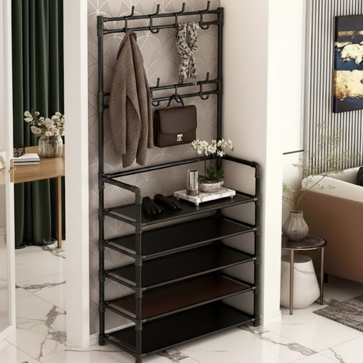 The Kouvr Hall Tree in minimalist white, featured in a bright, contemporary living space next to a front door, holding a cap and bag.