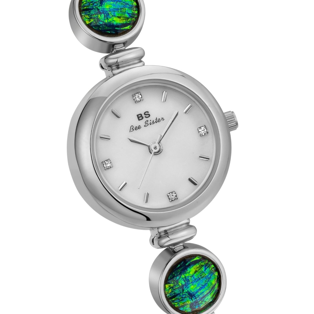 Silver kouvr watch with gemstone accents on a white background
