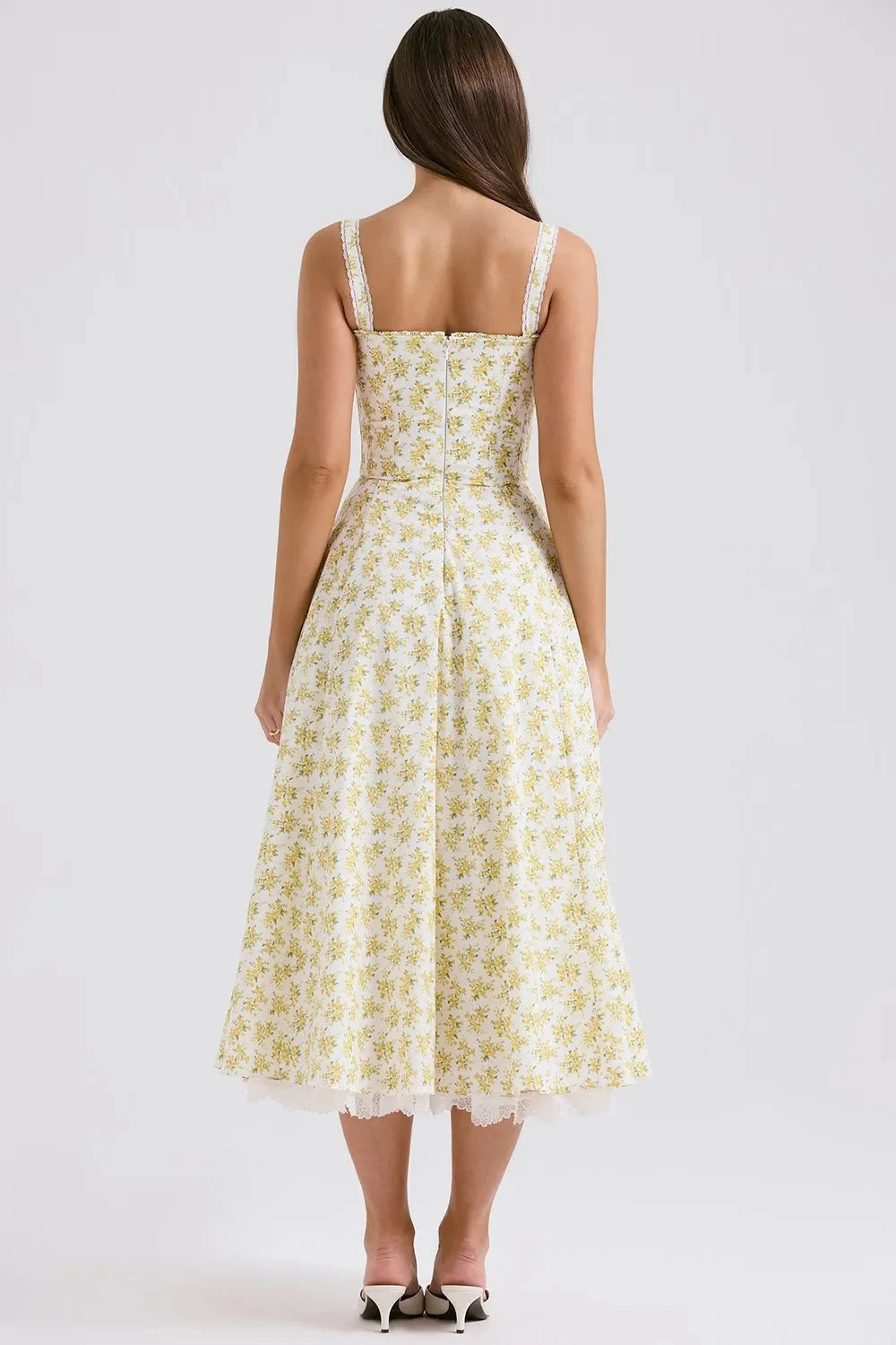Kouvr's Helena yellow floral vintage-inspired midi dress with sweetheart neckline and pockets