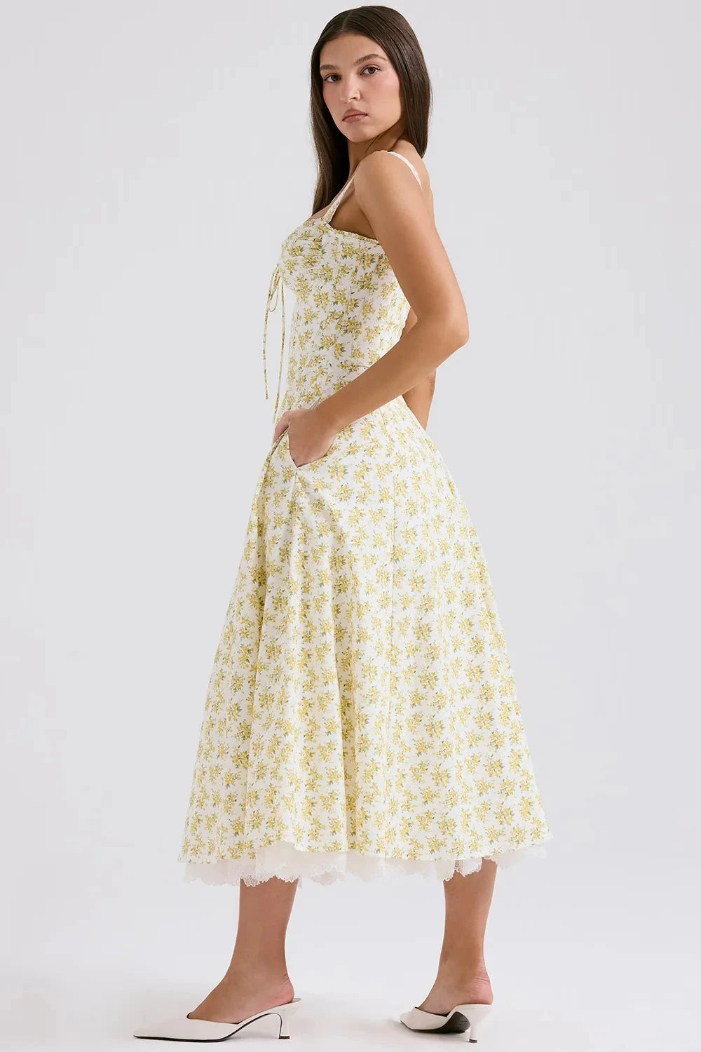 Kouvr's Helena yellow floral vintage-inspired midi dress with sweetheart neckline and pockets