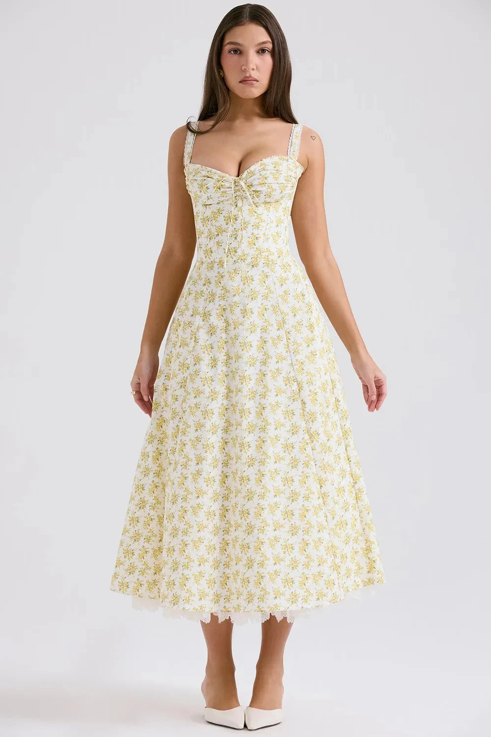 Kouvr's Helena yellow floral vintage-inspired midi dress with sweetheart neckline and pockets