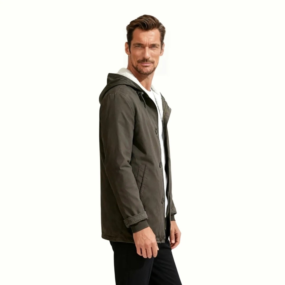 Side angle view of the men's dark grey sherpa lined hooded jacket by Kouvr Fashion, highlighting the sleeve construction and pocket placement.